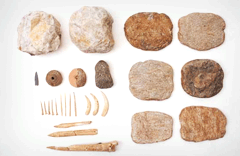 Various artifacts such as stone fishing-net sinkers excavated from Shell Mounds at Moido Island, Seohae image