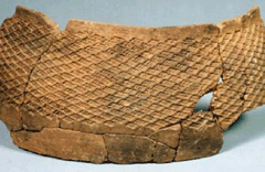 Pressed-down pattern earthenware excavated at the shell mound image