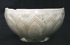 Celadon dish with raised and incised lotus design image