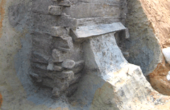 Southwest side of the wooden well image