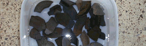 2. Categorized pottery fragments are rinsed with distilled water to remove foreign materials on the surface. image