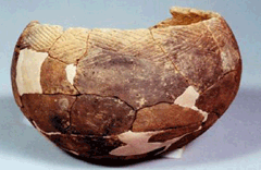 Pressed-down pattern earthenware excavated at the shell mound image