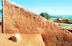 Exposed condition of a row of cylindrical earthenware objects image